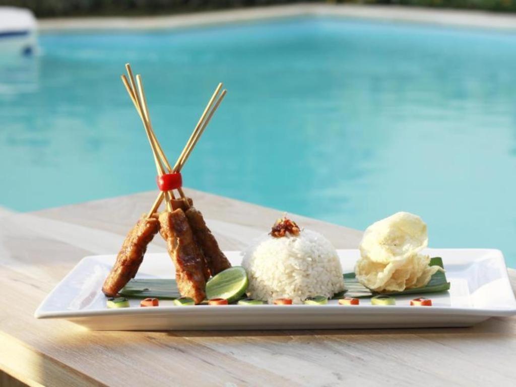 Spazzio Bali Hotel Кута Экстерьер фото